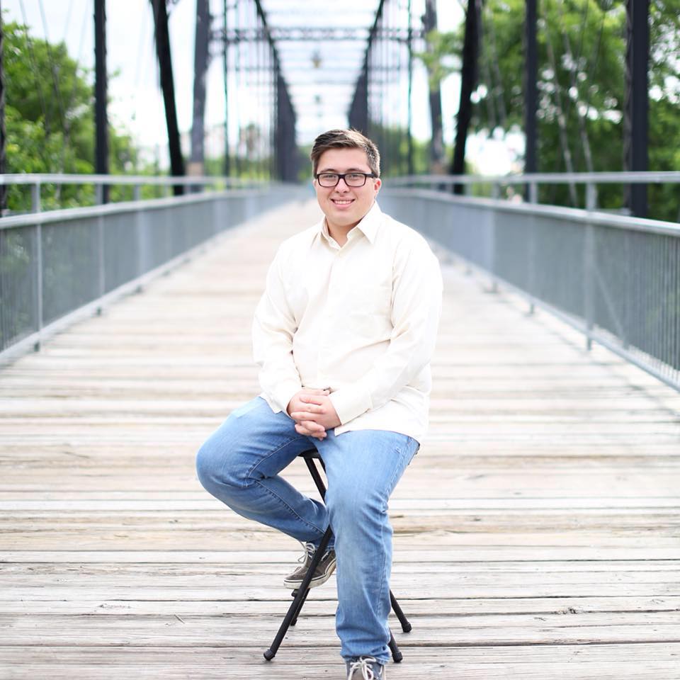 Michael Valdez smiling on Hays Bridge in San Antonio