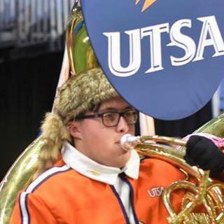 Michael Valdez playing sousaphone