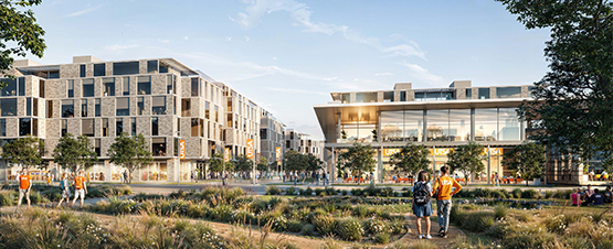 two students looking main campus buildings