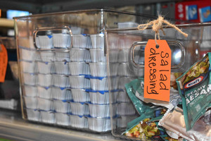 Bin with packets of salad dressing