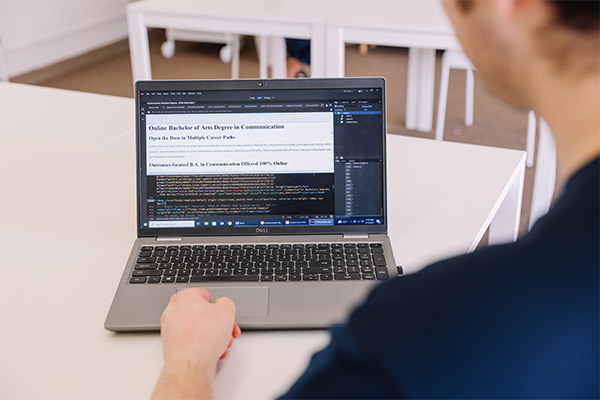 Student working on a laptop